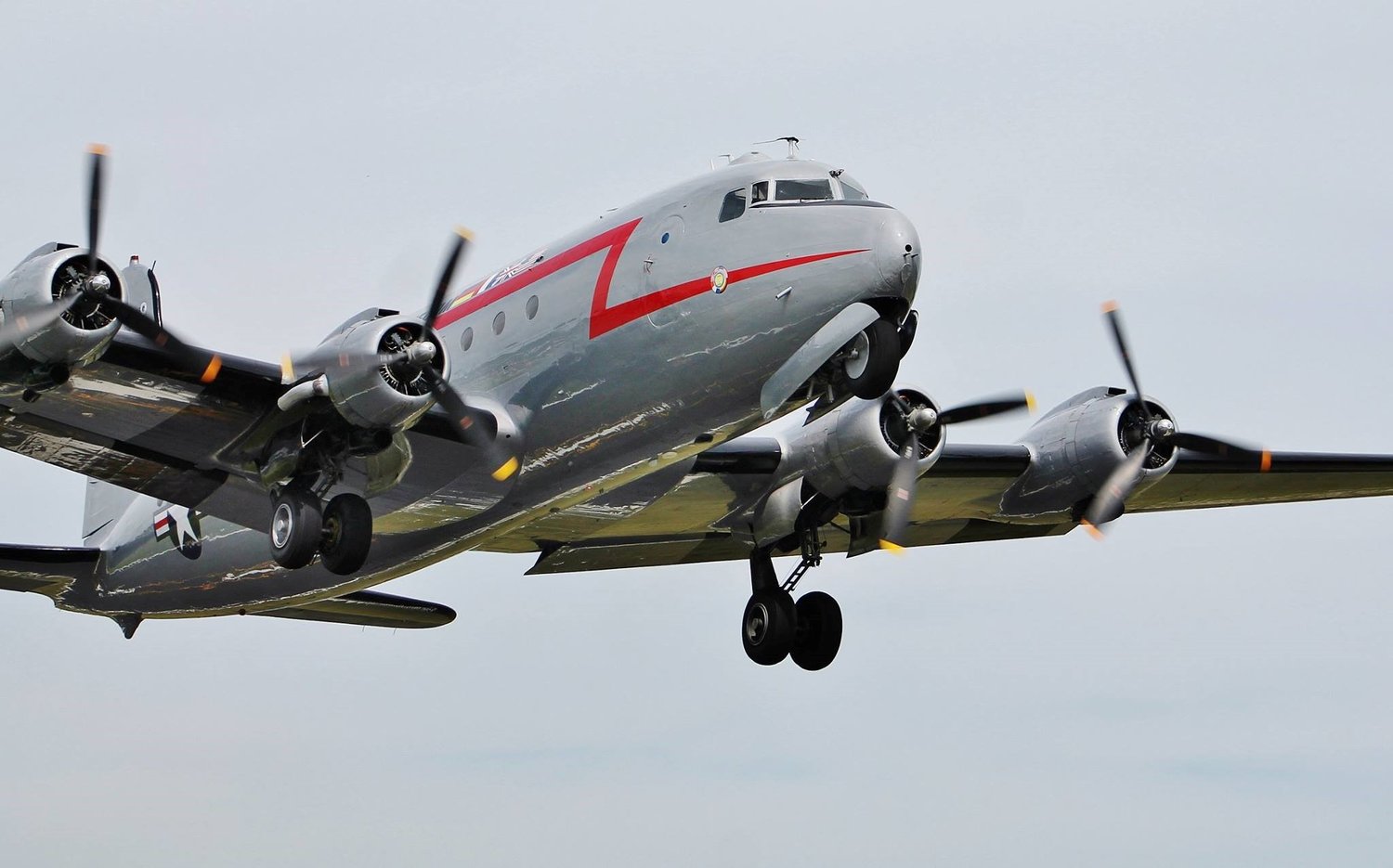 plane flying with blue sky in background